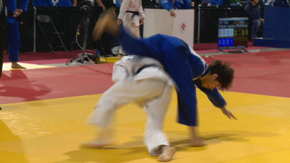 Judoka athlete throws their opponent