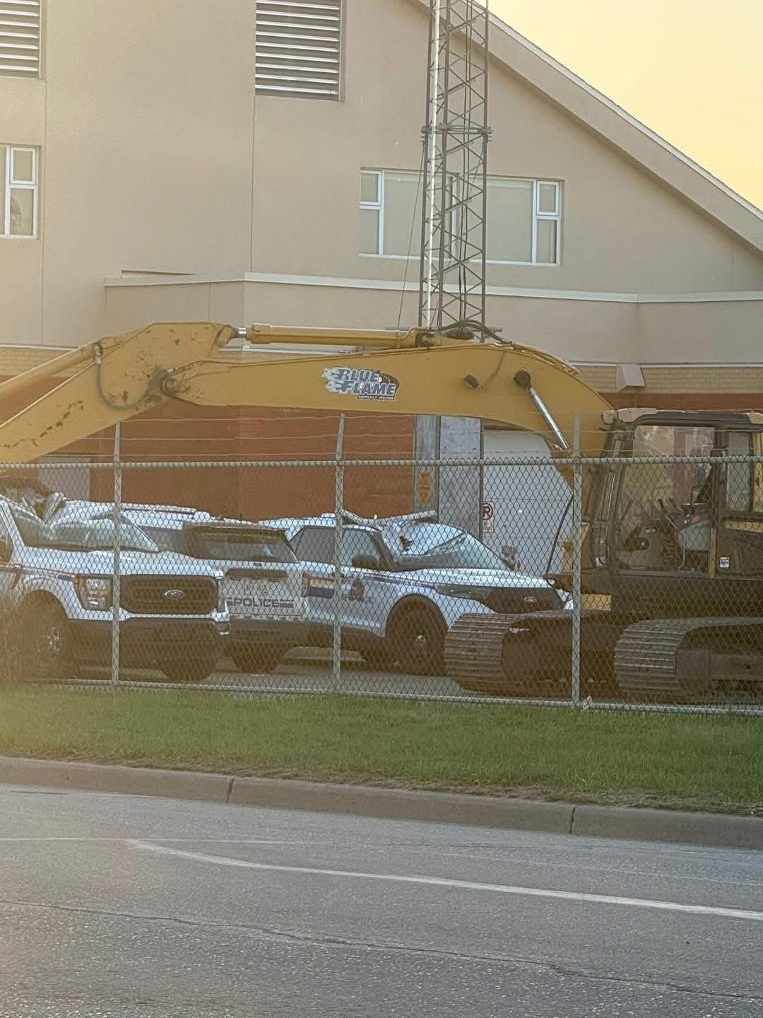 A stolen trackhoe (excavator) destroyed five cruisers at the Bonnyville RCMP detachment on Saturday, May 3, 2025.