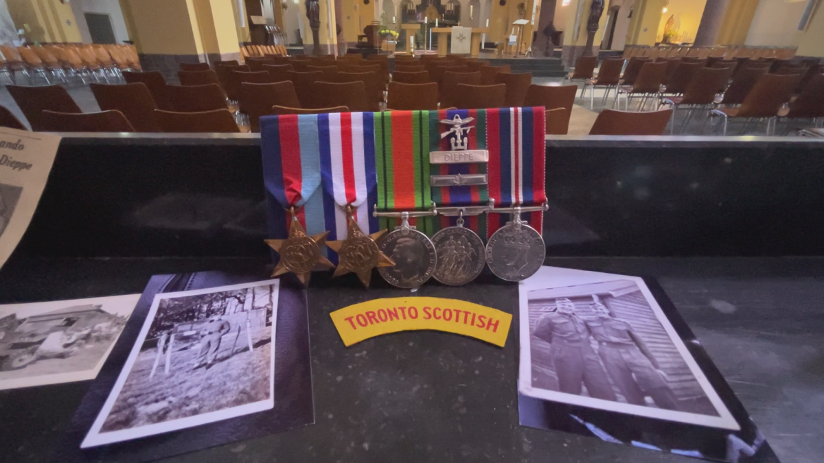 Photographs, medals and other items belonging to William Drissell, a Canadian soldier in the Second World War, on display at a church in the village of Groesbeek, Netherlands.