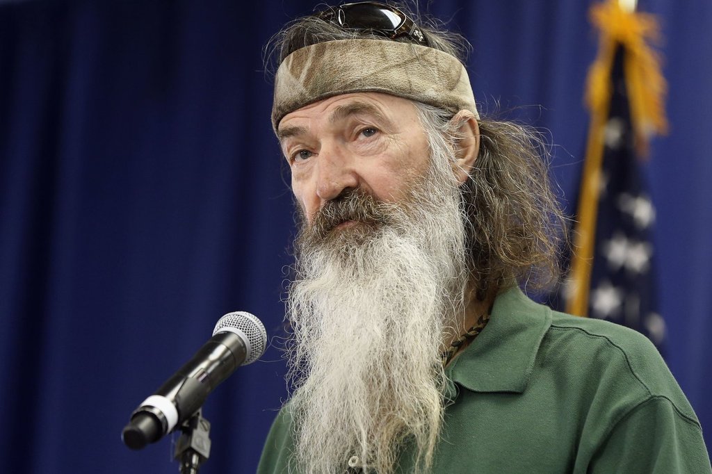 FILE - Phil Robertson of the Duck Dynasty reality television program speaks at a Republican presidential candidate, Sen. Ted Cruz, R-Texas, campaign stop, Feb. 19, 2016, in Myrtle Beach, S.C.