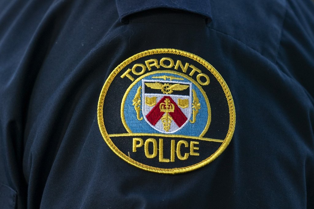 A Toronto Police Service logo patch is shown in Toronto, on Tuesday, Sept. 5, 2023. Toronto police say they've rescued one person after a plane landed in the water in the city's east end. 