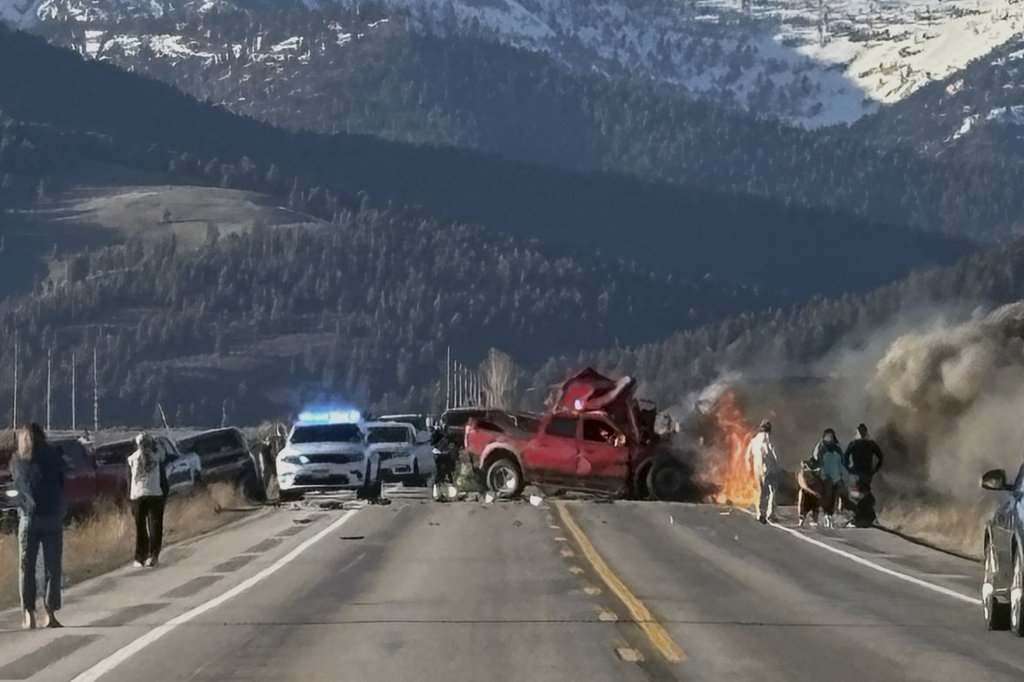 Rescue workers arrive to the scene after a deadly collision between a pickup truck and tour van near Henry’s Lake State Park in eastern Idaho on Thursday, May 1, 2025. 