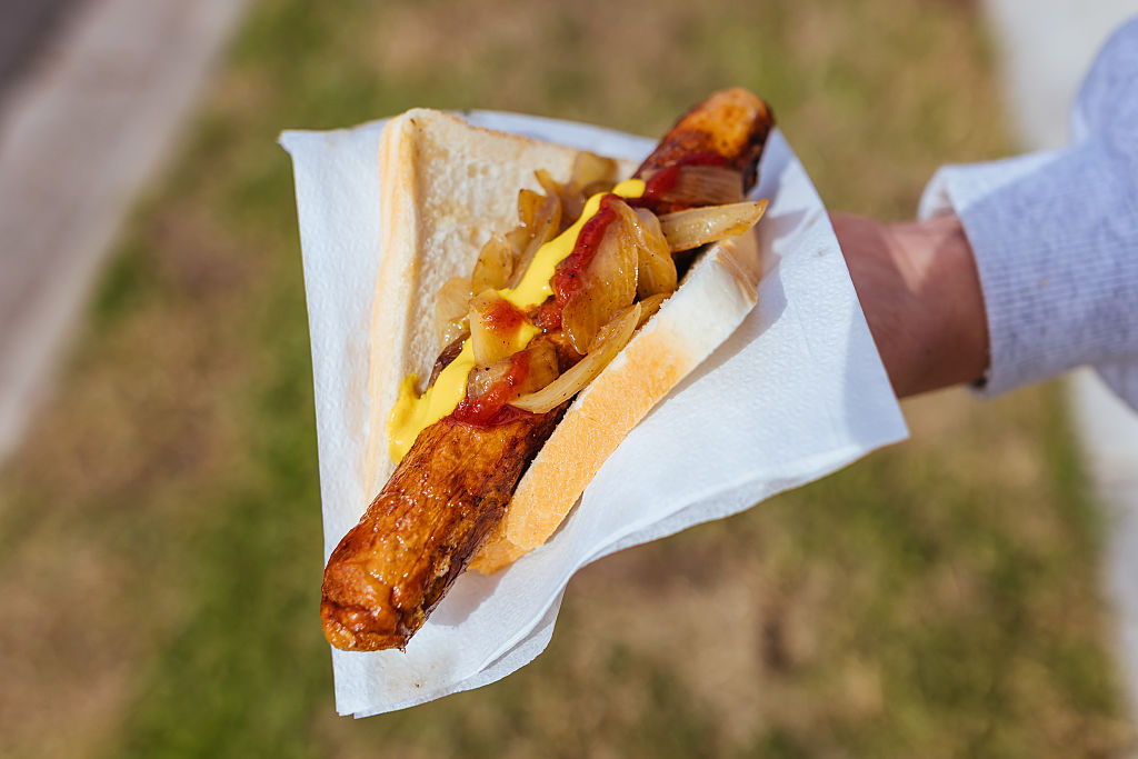 An election day sausage in bread from a BBQ, colloquially known as a sausage sizzle.
