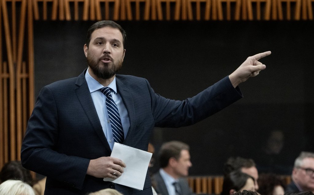 Conservative MP for Battle River-Crowfoot Damien Kurek rises during question period in Ottawa on Thursday, Dec. 14, 2023.