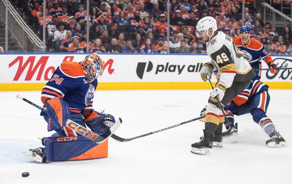 Vegas Golden Knights' Ivan Barbashev (49) is stopped by Edmonton Oilers goalie Stuart Skinner (74) during first period round 2, game 4 NHL Stanley Cup playoff action in Edmonton, Monday, May 12, 2025.