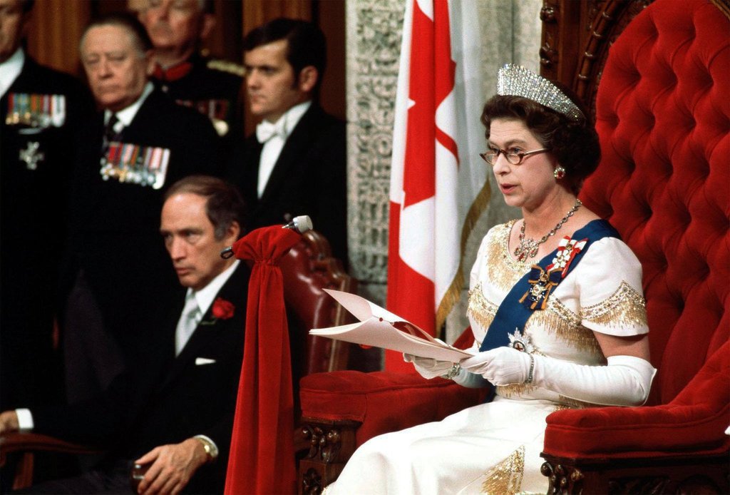 Queen Elizabeth II reads the Throne Speech in the Senate Chambers Oct. 18, 1977, officially opening the session of Parliament. 