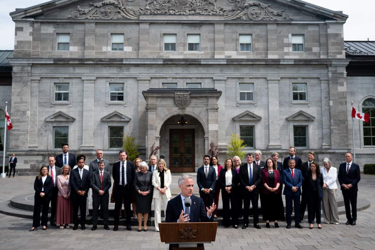 Prime Minister Mark Carney speaks to reporters following a swearing-in ceremony at Rideau Hall in Ottawa, on Tuesday, May 13, 2025.