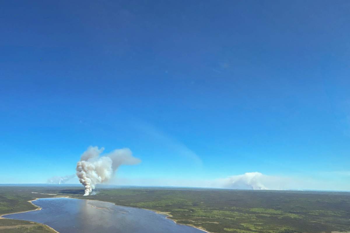 The community of Chipewyan Lake, located about 130 kilometres north of Fort McMurray, is threatened by a group of fires known as the Red Earth wildfire complex and Alberta's Minister of Forestry and Parks, Todd Loewen, said there are indications some structures have been lost.
