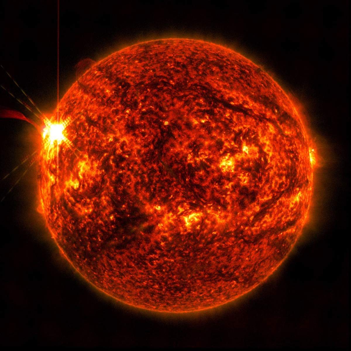 This image captured by NASA's Solar Dynamics Observatory shows an X2.7-rated solar flare erupting from the sun on May 14, 2025.