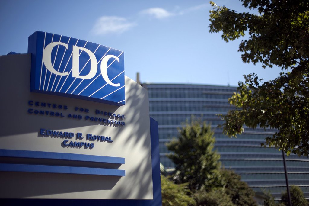 FILE - A sign marks the entrance to the federal Centers for Disease Control and Prevention (CDC) in Atlanta, on Oct. 8, 2013. (AP Photo/David Goldman, File).