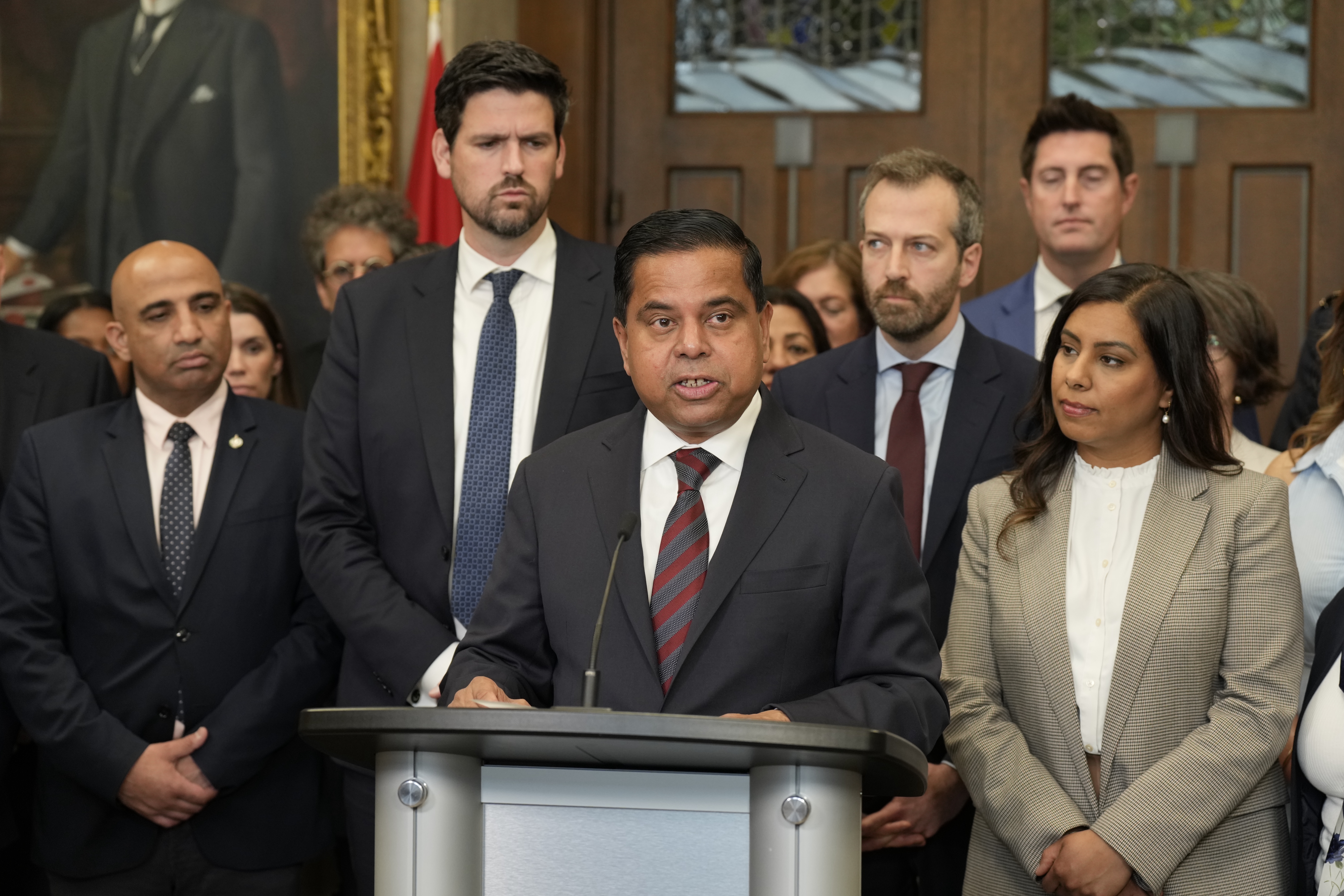 Minister of Public Safety Gary Anandasangaree (at podium) announces legislation toughening Canada’s borders on Parliament Hill, June 3, 2025. THE CANADIAN PRESS/Adrian Wyld
