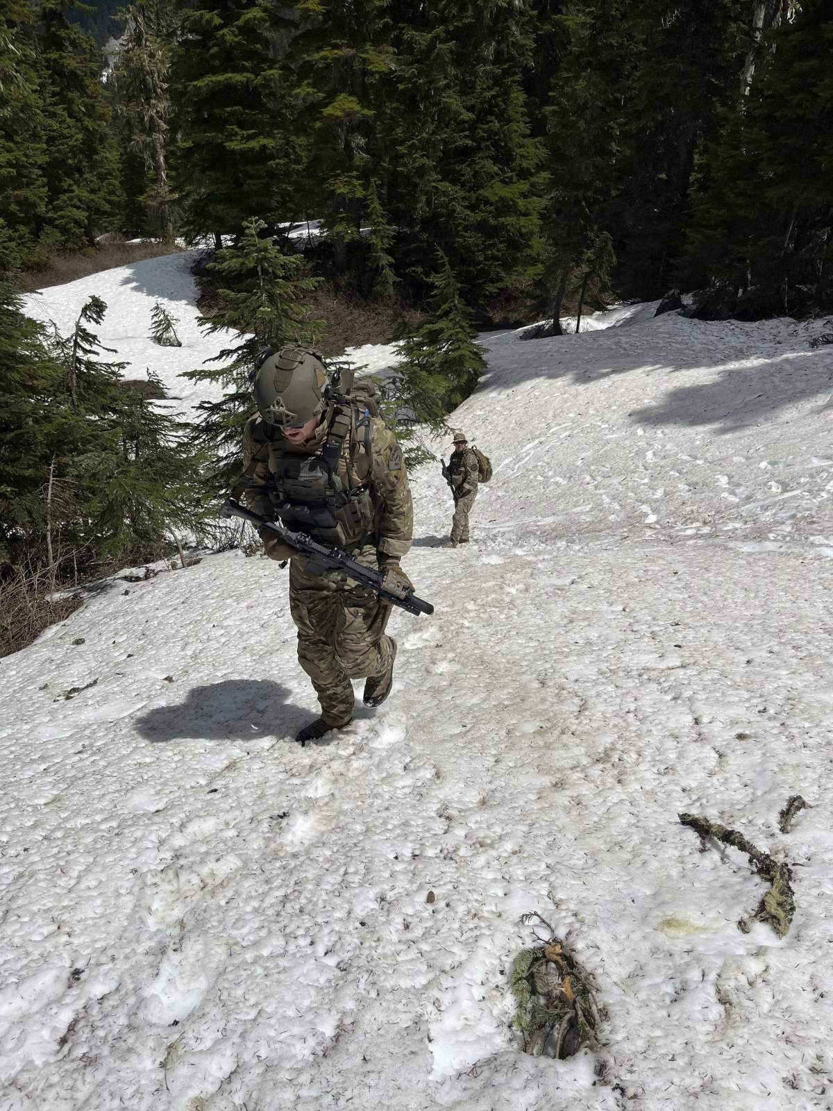 In this handout photo provided by the Snohomish County Sheriff's Office deputies participate in the search for Travis Decker, at an undisclosed location in Washington state, Friday, June 6, 2025.