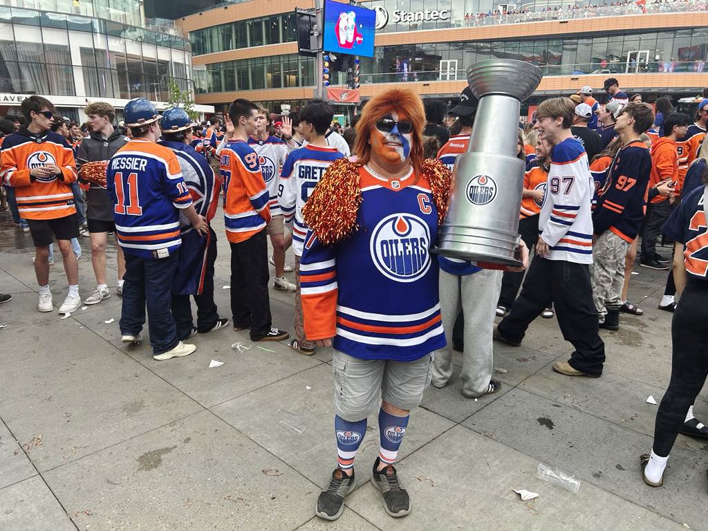 Kevin Follett, of Fort McMurray, poses in the 'Moss Pit' outside of Rogers Place ahead of Game 2 of the Stanley Cup final between the Edmonton Oilers and the Florida Panthers in Edmonton on Friday, June 6, 2025.