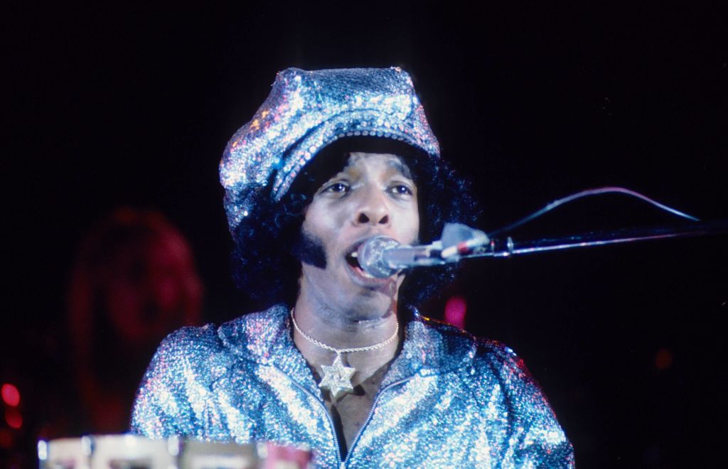 Sly Stone of Sly And The Family Stone performs on stage in July 1974 in Los Angeles.