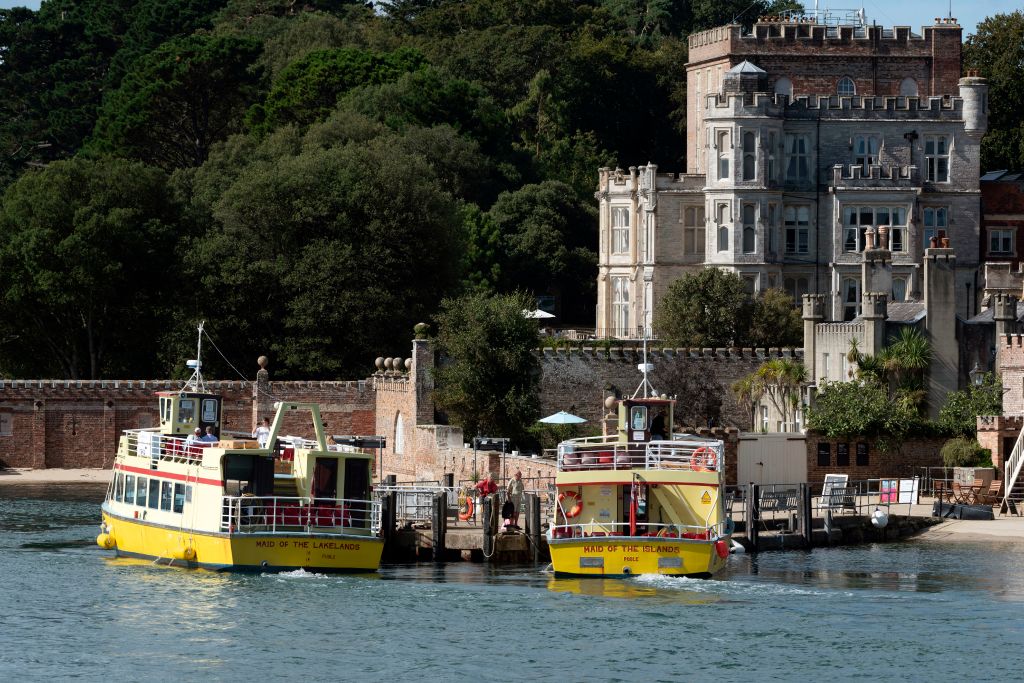 Brownsea Island, Poole Harbor, Dorset, England, UK, Passenger ferries waiting for tourists to return to the mainland.