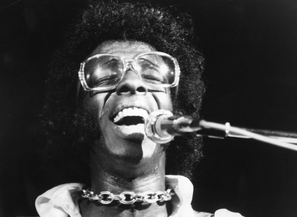 Musician Sly Stone of the psychedelic soul group "Sly And The Family Stone" performs at the 1969 Woodstock Festival on August 17, 1969 in Bethel, New York.