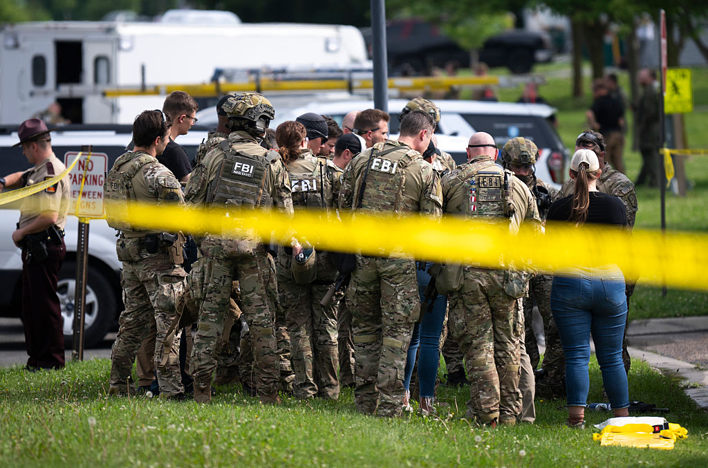 Law enforcement agencies during their search for Vance Boelter, a suspect in the killing of State Rep. Melissa Hortman and her husband, Mark Hortman, who were shot dead at their Minnesota home.