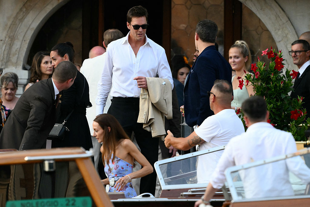 Tom Brady gets on a taxi boat at the Gritti Palace Hotel ahead of the wedding of Amazon's founder Jeff Bezos with Lauren Sanchez in Venice on June 26, 2026.