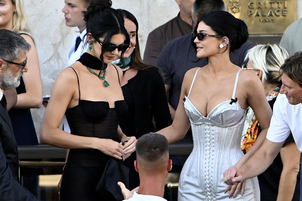 Kylie Jenner and US model Kendall Jenner leave the Gritti Palace Hotel on the wedding day of Amazon founder Jeff Bezos with Lauren Sanchez, in Venice on June 27, 2025.