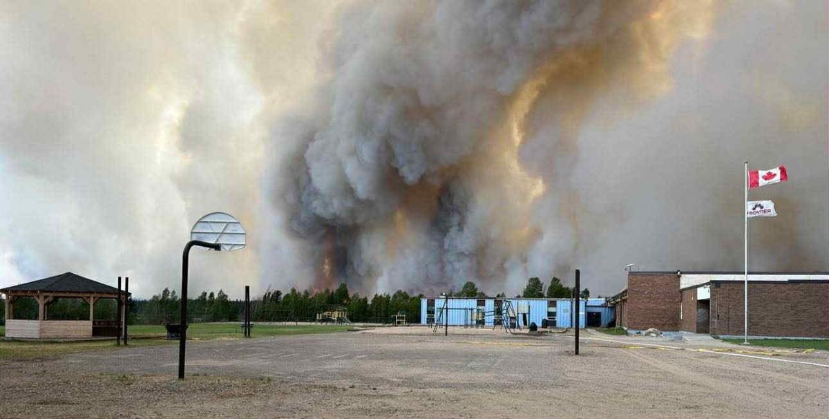 A wildfire burns in the Manitoba town of Lynn Lake.