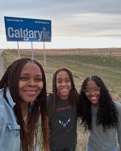 American resident Pamela Smith and two of her children in Calgary, Alta.