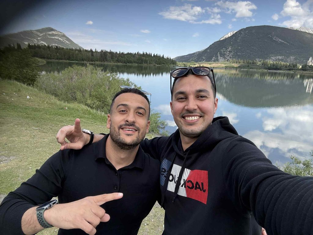 Khaled Elgamal and Hamza Benhilal are shown in this handout photo. Elgamal (left) who survived a rock slide in Banff National Park, credits his 33-year-old friend Benhilal, who didn't make it out alive, for saving his life.