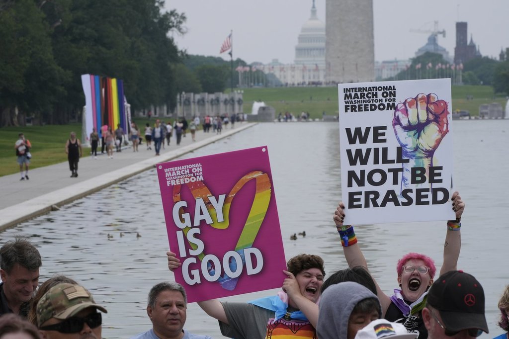 People attend the World Pride Rally and March at the Lincoln Memorial, Sunday, June 8, 2025, on the National Mall in Washington.