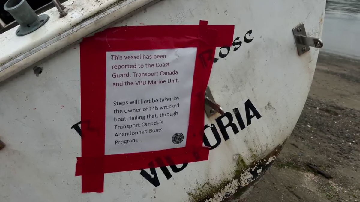 A notice posted on a wrecked sailboat in Vancouver in May. 