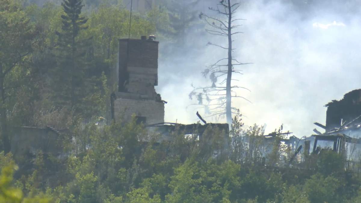 When fire crews arrived at the house on Short Road northwest, there was heavy smoke and flames coming from the building.