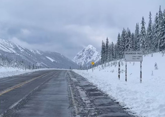 This photo, taken at the Highwood Pass on Sunday, shows the heavy snow that made the road virtually impassable and sent some unprepared motorists sliding into the ditch.