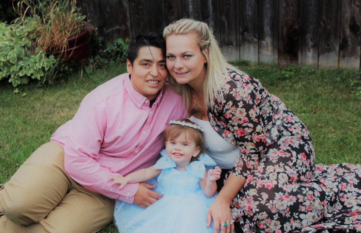 Ashton Wilson, his fiancée Miranda Sharp and their daughter Charlize.