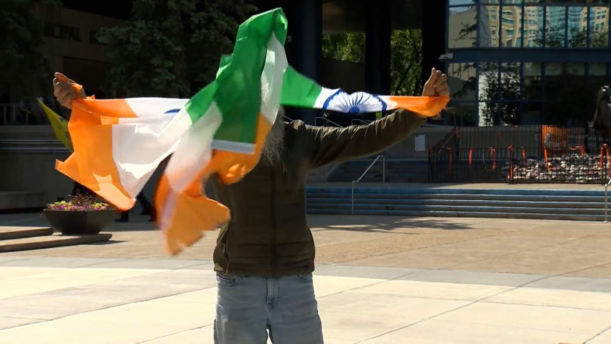One of the Khalistan supporters on hand at Monday's protest could be seen ripping up an Indian flag.