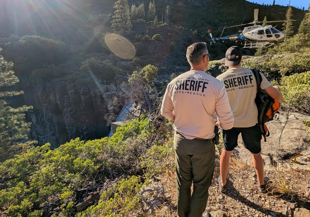 Three hikers who disappeared after jumping into a waterfall in