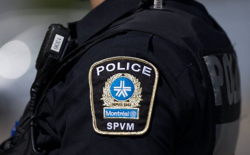 A Montreal police shoulder patch is seen on an officer in Montreal, Thursday, Aug. 29, 2024. THE CANADIAN PRESS/Christinne Muschi.