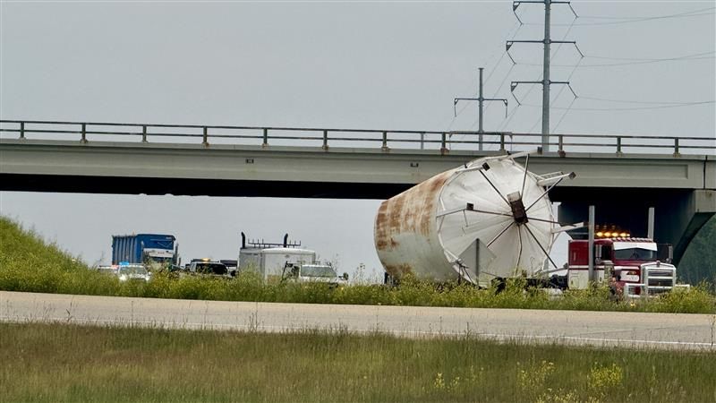 A truck hauling a grain silo hit the Highway 21 bridge at Highway 14 southeast of Sherwood Park, Alta., on July 4, 2025.