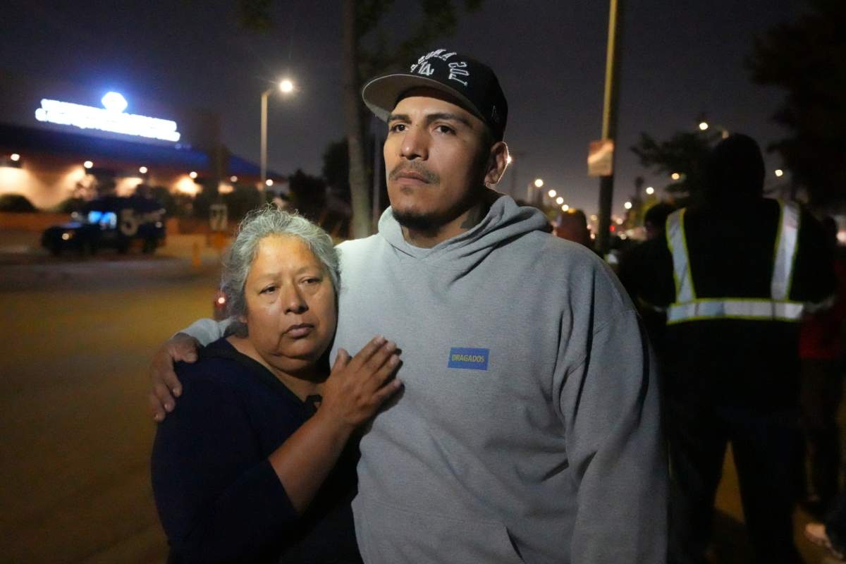 Maria Orozco hugs her son, Oraldo Orozco, one of her three sons who were trapped as tunnel workers inside a collapsed tunnel under construction for Los Angeles County's Clean Water project, Wednesday, July 9, 2025, in Los Angeles.