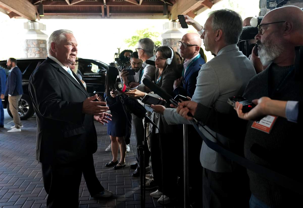Ontario Premier Doug Ford speaks to the media during the meeting of Canada’s premiers at Deerhurst Resort in Huntsville, Ont., on Monday, July 21, 2025.