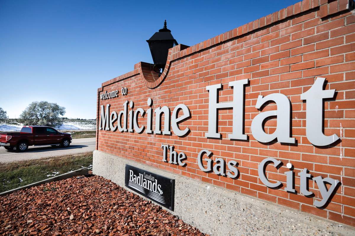 A sign declaring it "The Gas City" welcomes motorists on the Trans Canada Highway in Medicine Hat, Alta., Wednesday, Oct. 2, 2019.