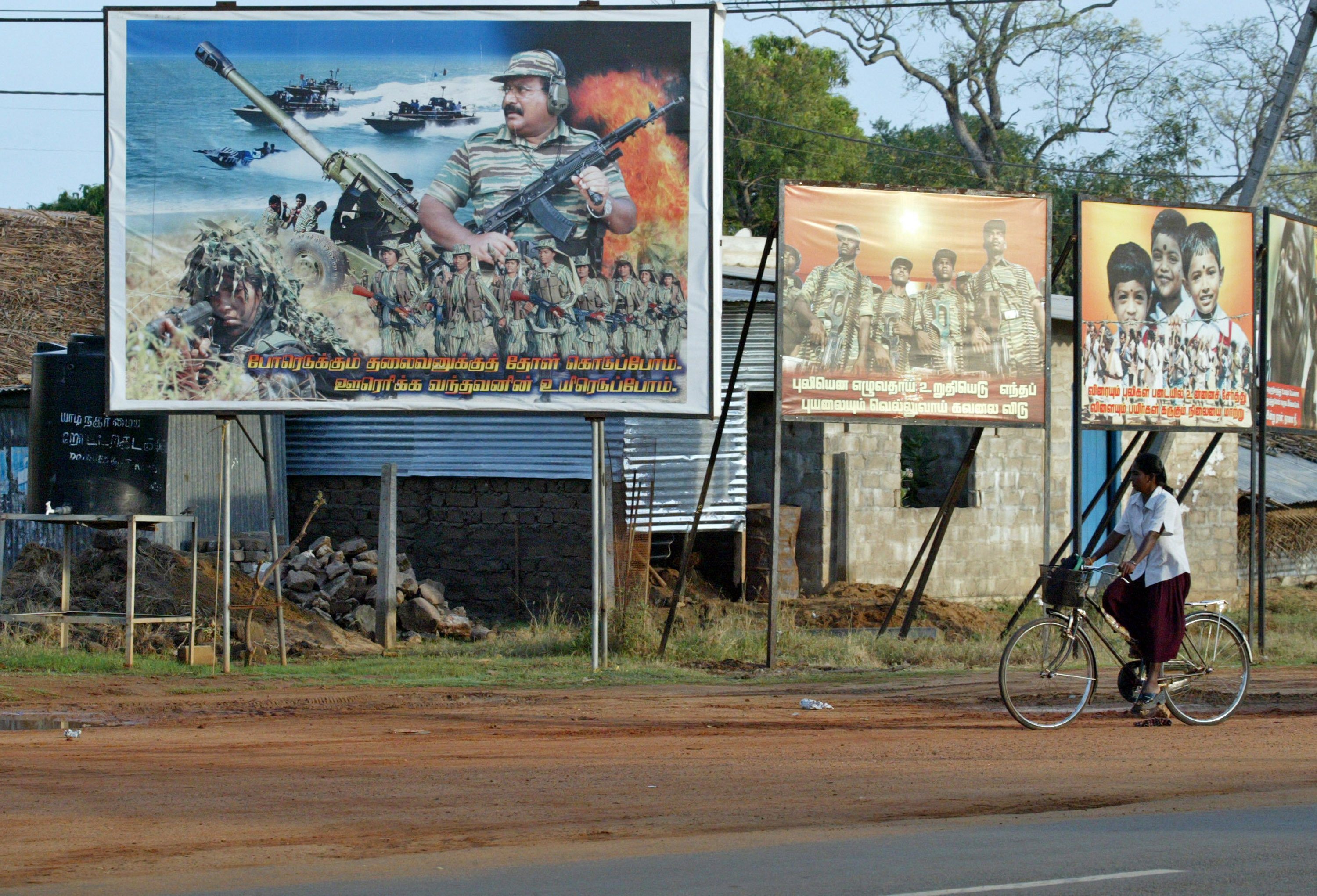 Propaganda billboards urge Tamils to join Liberation Tigers of Tamil Eelam (LTTE) in a rebel controlled section of Sri Lanka, April 22, 2007. (AP Photo/Gemunu Amarasinghe)