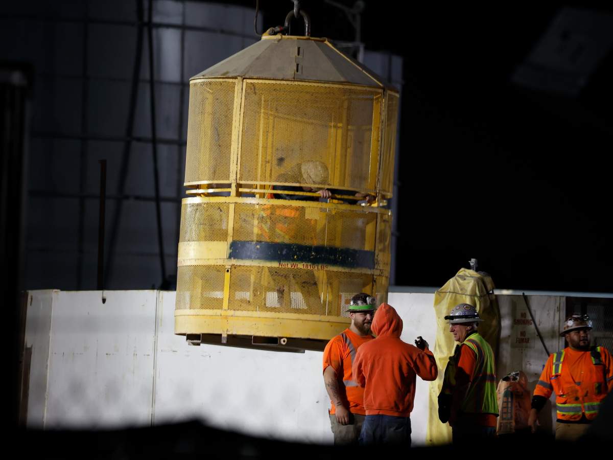 People work by the entrance of the collapsed tunnel in Wilmington, Los Angeles, California, the United States on July 9, 2025. Thirty-one workers, who were trapped following a tunnel collapse in the Wilmington area of Los Angeles on Wednesday evening, have been rescued, the Los Angeles Fire Department said.
