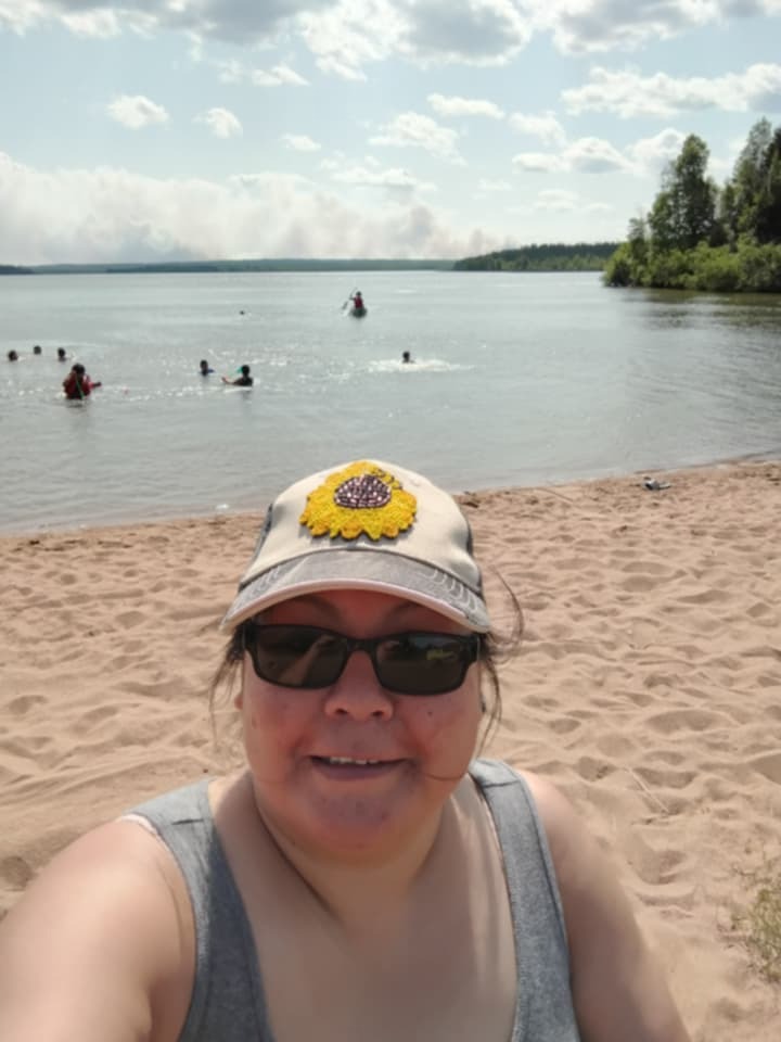 Beatrice Linklater at the beach near Leaf Rapids on Canada Day. About a week later, they were placed under a mandatory evacuation order.
