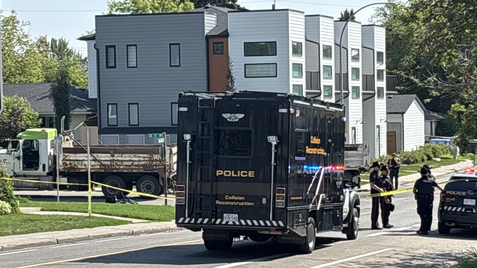 Cyclist killed in collision with dump truck in Calgary’s southwest