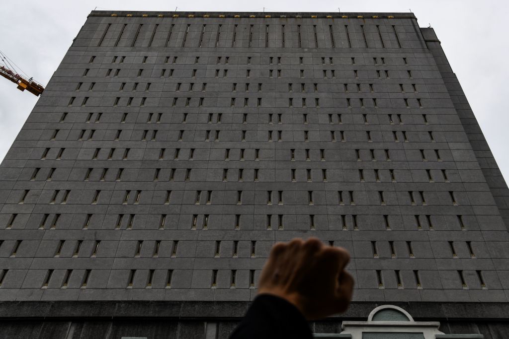 Protestors gather outside the Federal Detention Center in Miami on June 12, 2020.