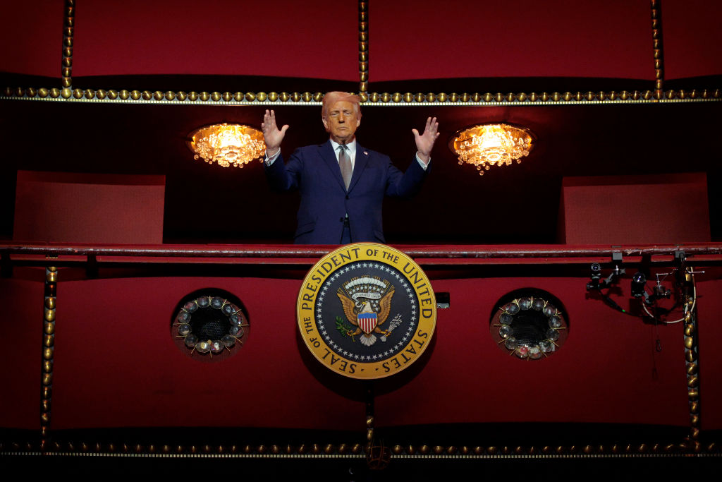 President Donald Trump looks down from the Presidential Box in the Opera House at the John F. Kennedy Center for the Performing Arts as he participates in a guided tour and leads a board meeting on March 17, 2025 in Washington, DC.
