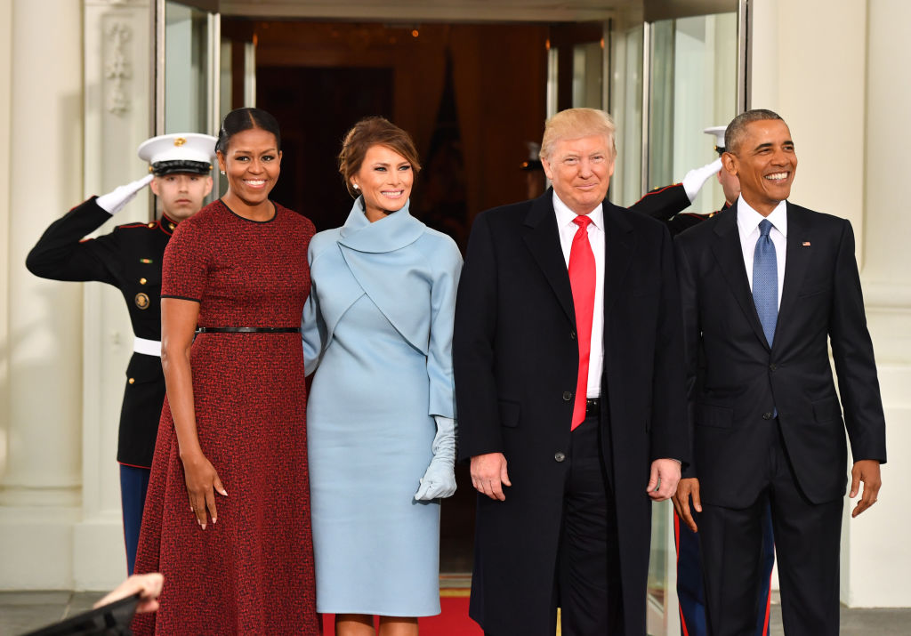 Former U.S. President Barack Obama, from right, U.S. President Donald Trump, U.S. First Lady Melania Trump, and former U.S. First Lady Michelle Obama stand for a photograph outside of the White House ahead of the 58th presidential inauguration in Washington, D.C., U.S., on Friday, Jan. 20, 2017.