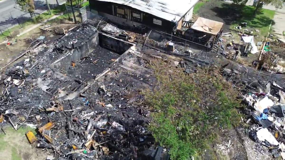 A photo taken on July 7, 2025 shows the aftermath of a fire that destroyed one home and damaged another in Lamont, Alta., on July 4, 2025.