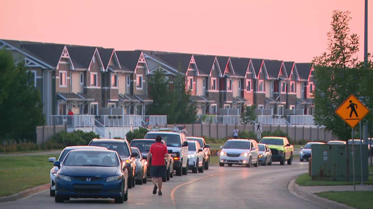 A train blocked vehicle traffic on Maple Road in southeast Edmonton on Monday, July 28, 2025.