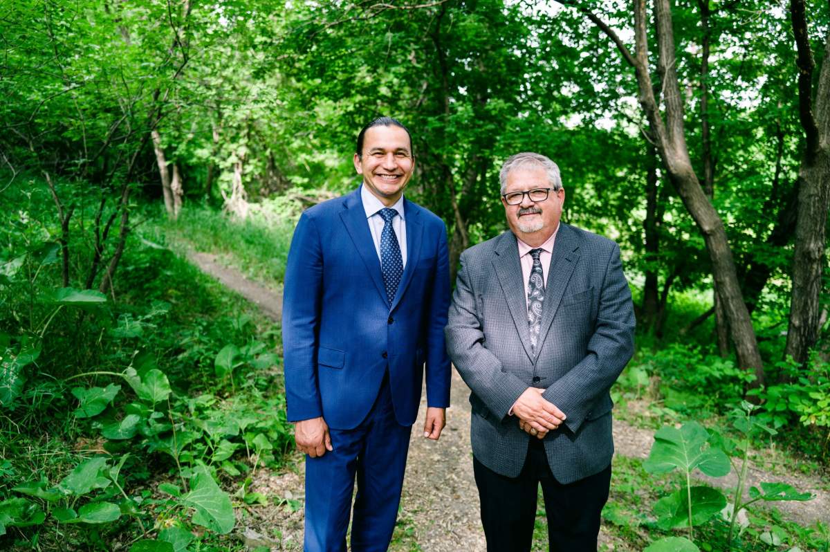 Manitoba premier Wab Kinew and Spruce Woods NDP candidate Ray Berthelette.