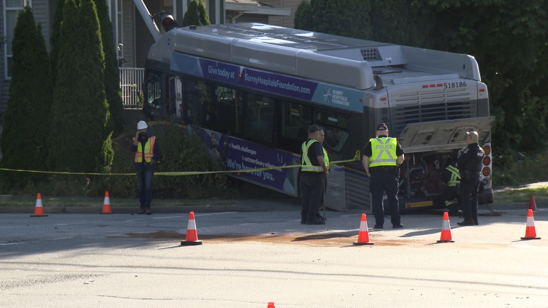 Crash sends bus into front yard in Surrey