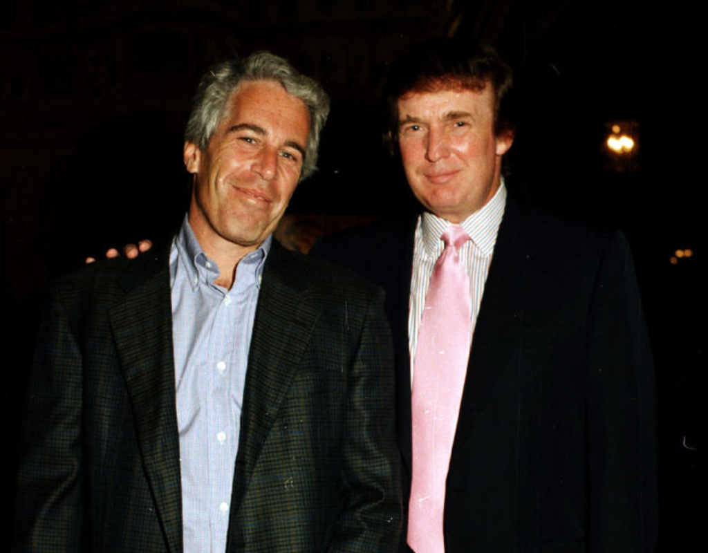 Portrait of American financier Jeffrey Epstein (left) and Donald Trump as they pose together at the Mar-a-Lago estate, Palm Beach, Florida, 1997.